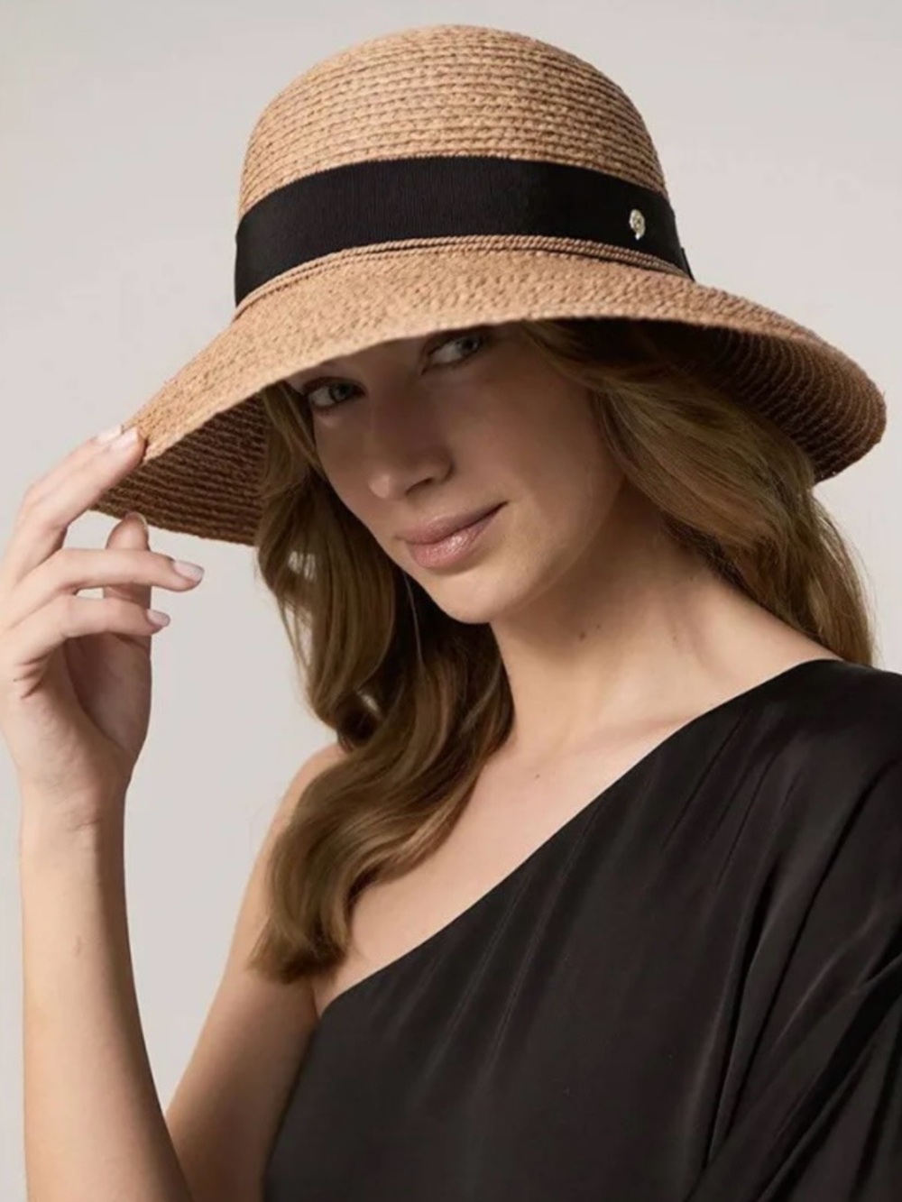 Helen Kaminski Australia  100% Raffia Sun Hat. Black grosgrain bow.